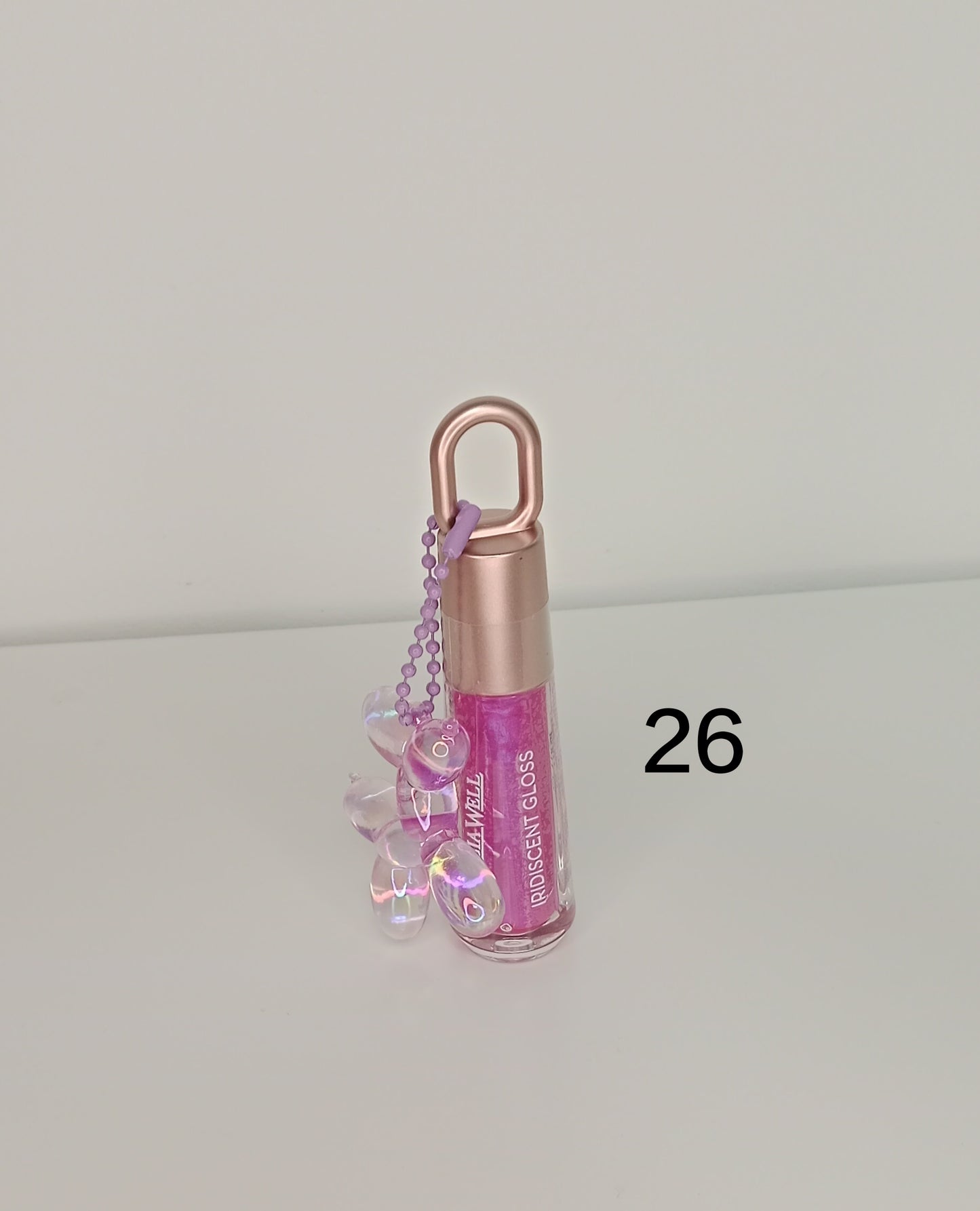 ✨ Gloss labial iridiscente Leticia Well – Brillo mágico & acabado holográfico 💎