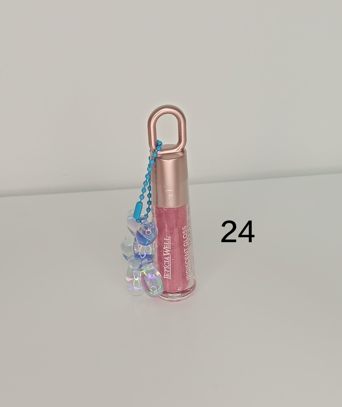 ✨ Gloss labial iridiscente Leticia Well – Brillo mágico & acabado holográfico 💎