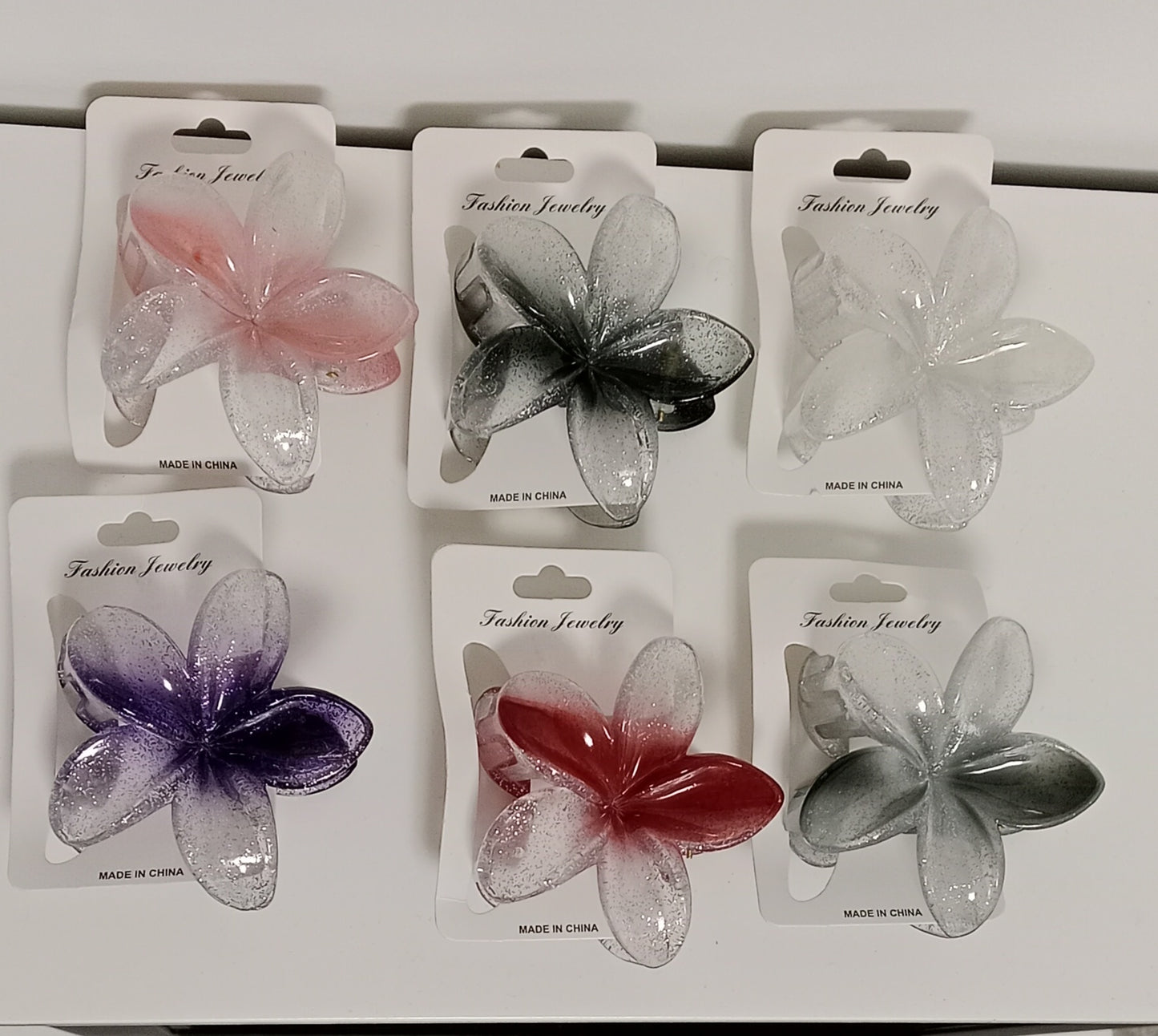 Pinzas de pelo flor Hawaiana con brillo ✨ tropicoqueta🌸